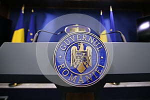 RomaniaÃ¢â¬â¢s emblem with the Romanian government text photo